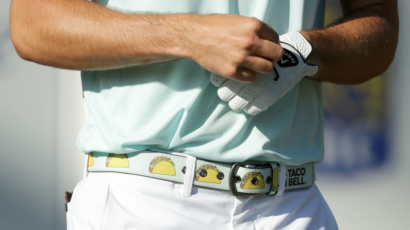 Golfer Wesley Bryan sports a Taco Bell belt during the first round of the 2018 RBC Heritage at Harbour Town Golf Links in April in Hilton Head Island, South Carolina.